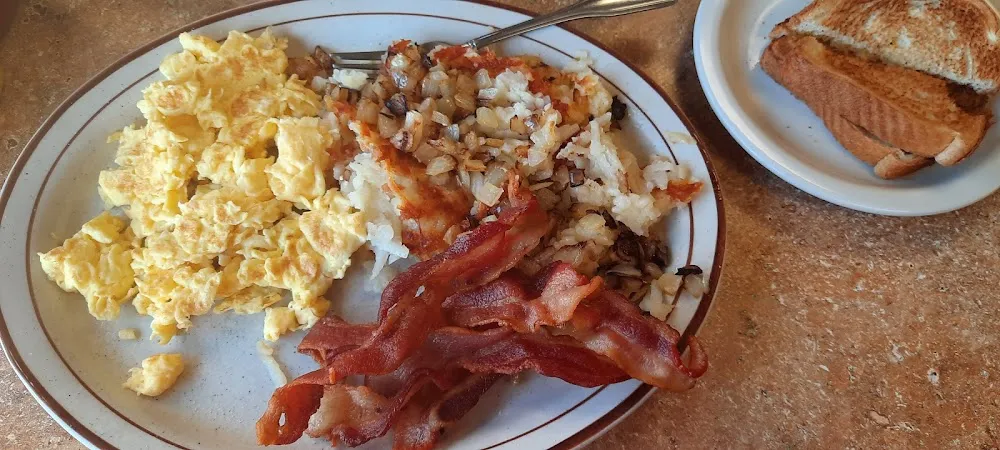 Scrambled Eggs Bacon Hash Rows with Onion and Toast